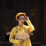 woman-wearing-traditional-ao-dai-clothing-min-compress