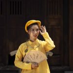woman-wearing-traditional-ao-dai-clothing-min-compress